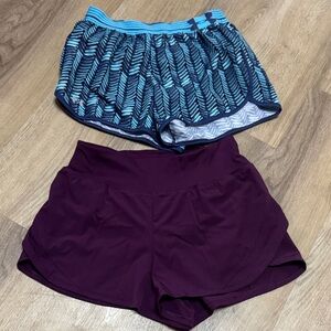 2 pairs of running Shorts under armor & avia size XS both fit like small